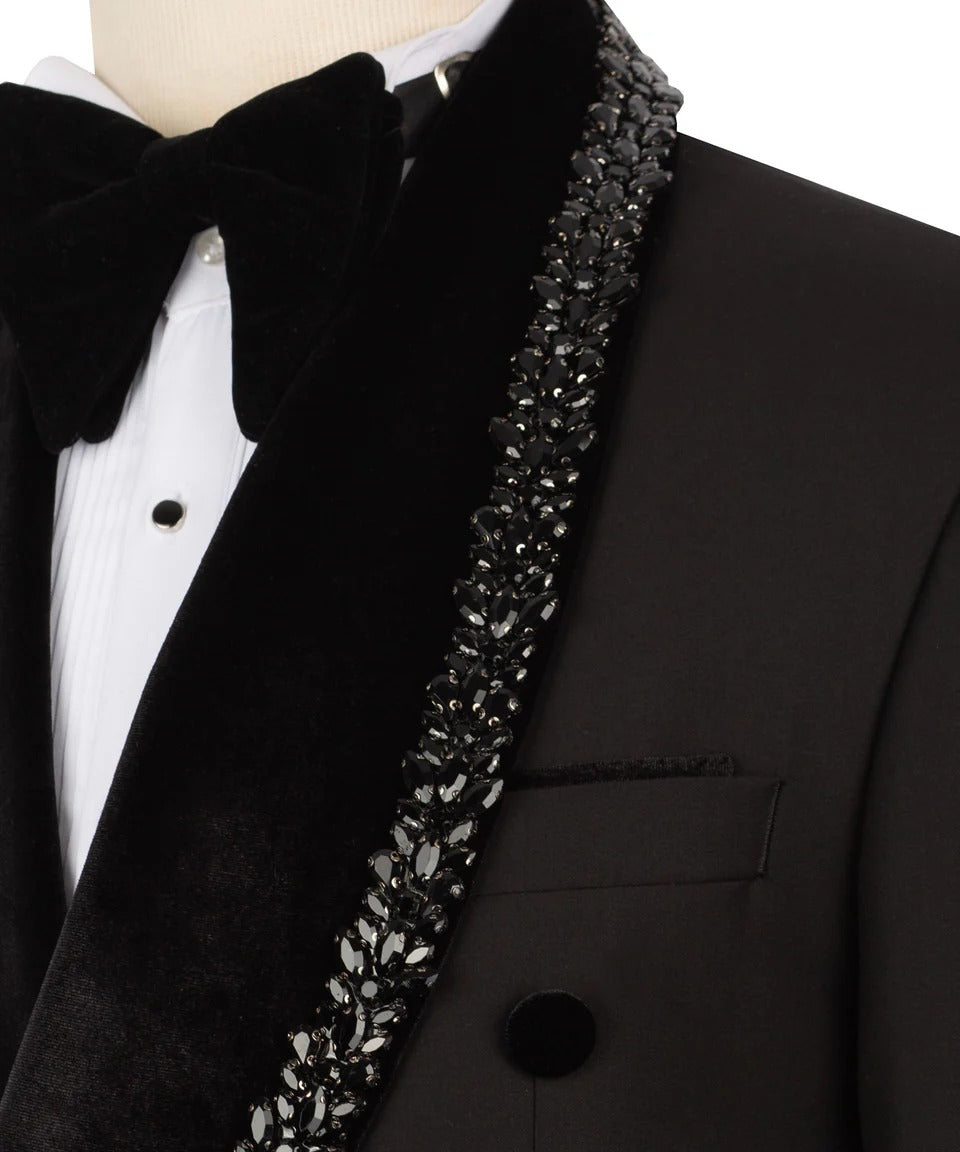 Black tuxedo with a bow tie and decorative lapel on a mannequin.