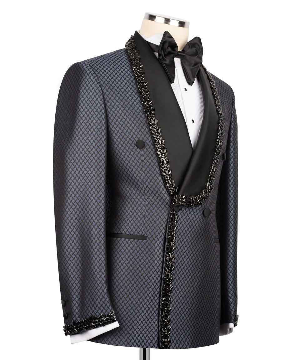 Black patterned tuxedo with decorative lapels on a mannequin against a white background