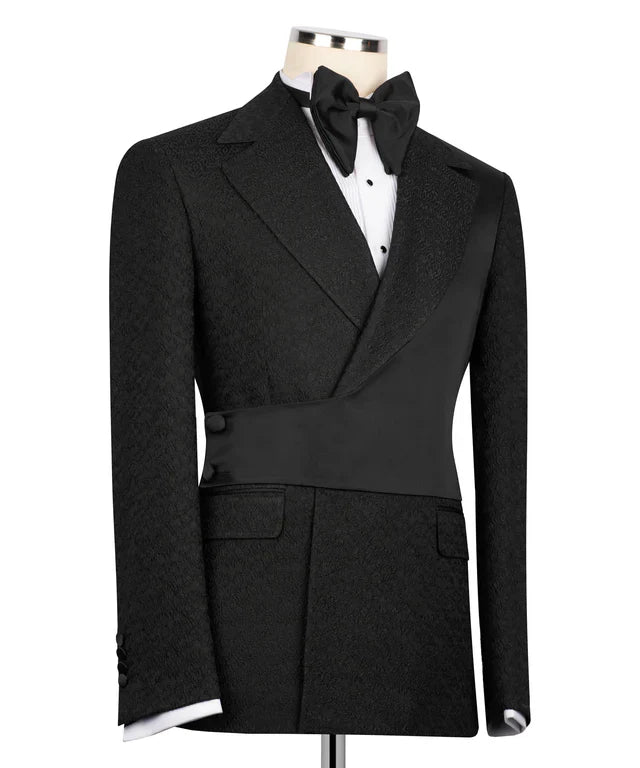 KOSS ATELIER black double-breasted tuxedo jacket on mannequin with satin shawl lapel waist sash and bow tie