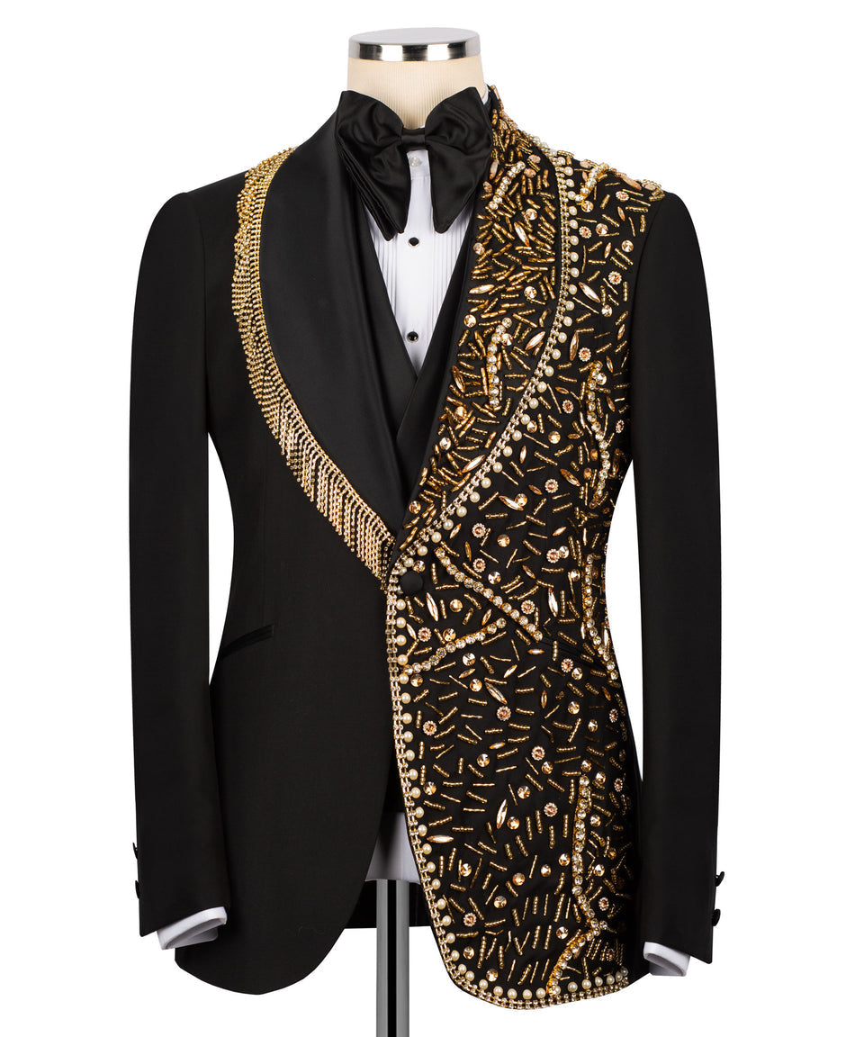 KOSS ATELIER handmade black tuxedo with gold details embroidered right panel and gold fringe shawl lapel on mannequin
