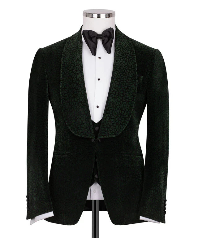 KOSS ATELIER dark green velvet tuxedo jacket with patterned shawl lapel and black bow tie on mannequin