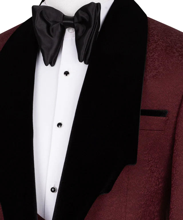 KOSS ATELIER maroon tuxedo with black collar velvet shawl black bow tie and white dress shirt with studs