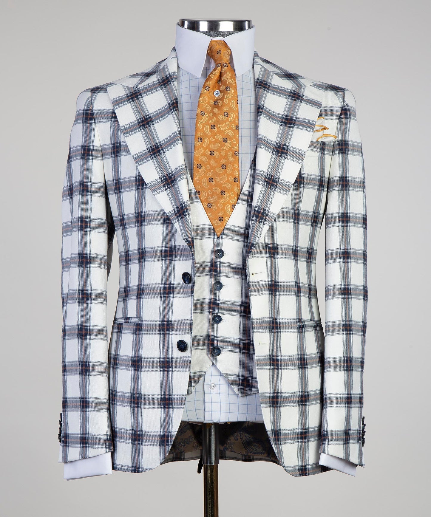 Luxury casual White plaid suit featuring a stylish blazer, waistcoat, and orange patterned tie