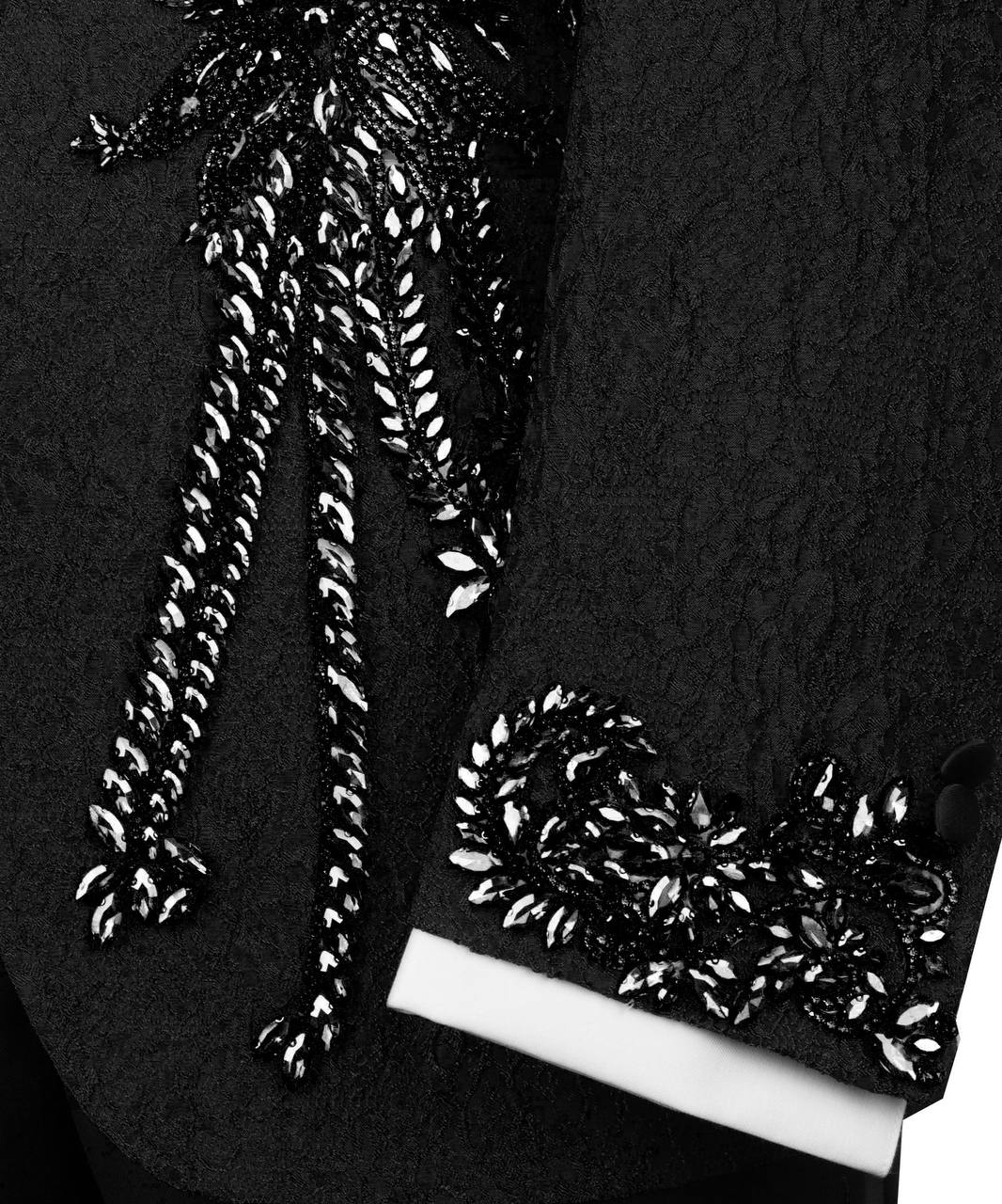 KOSS ATELIER black sequin tuxedo for men close up of textured jacket sleeve and embellished cuff over white shirt