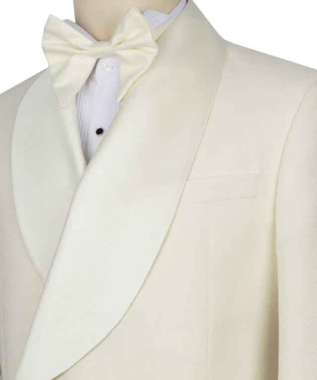 KOSS ATELIER cream double breasted tuxedo with wide shawl lapel cream bow tie and pleated tuxedo shirt