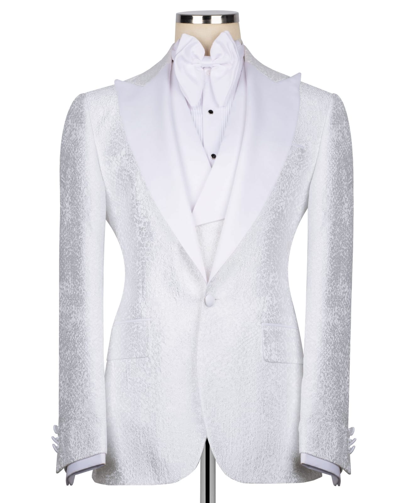 KOSS ATELIER white textured tuxedo for men single button jacket with shawl lapel matching vest and bow tie on mannequin
