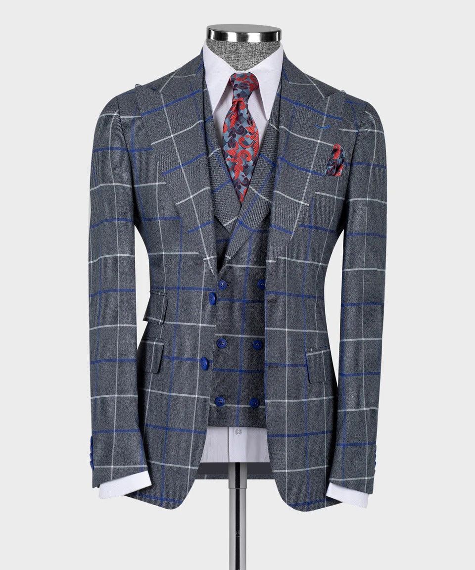 KOSS ATELIER grey and blue windowpane 3-piece suit on mannequin with double breasted vest white shirt red patterned tie