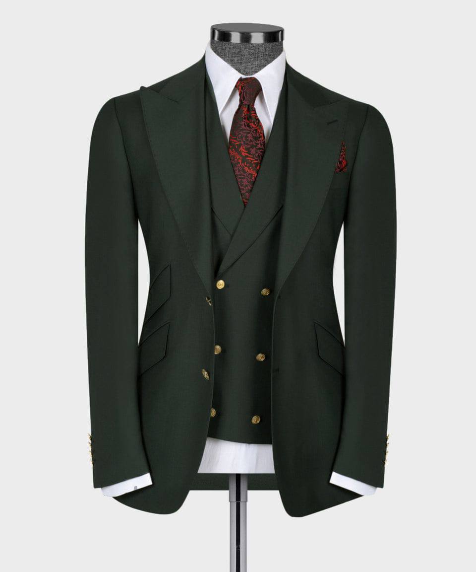KOSS ATELIER deep green three piece suit on mannequin with double breasted waistcoat gold buttons white shirt and red paisley tie