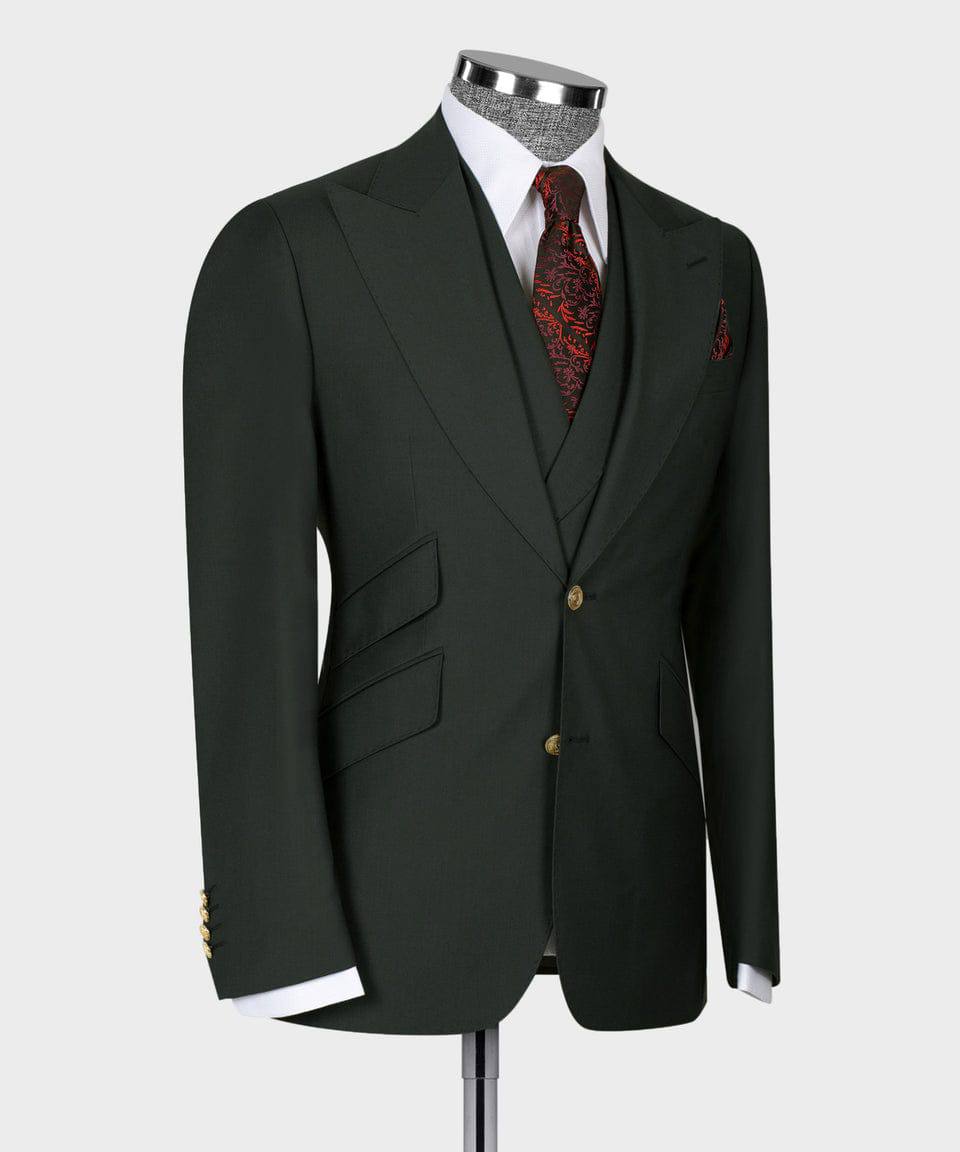 KOSS ATELIER deep green three piece suit on mannequin with tailored jacket waistcoat white shirt and red patterned tie