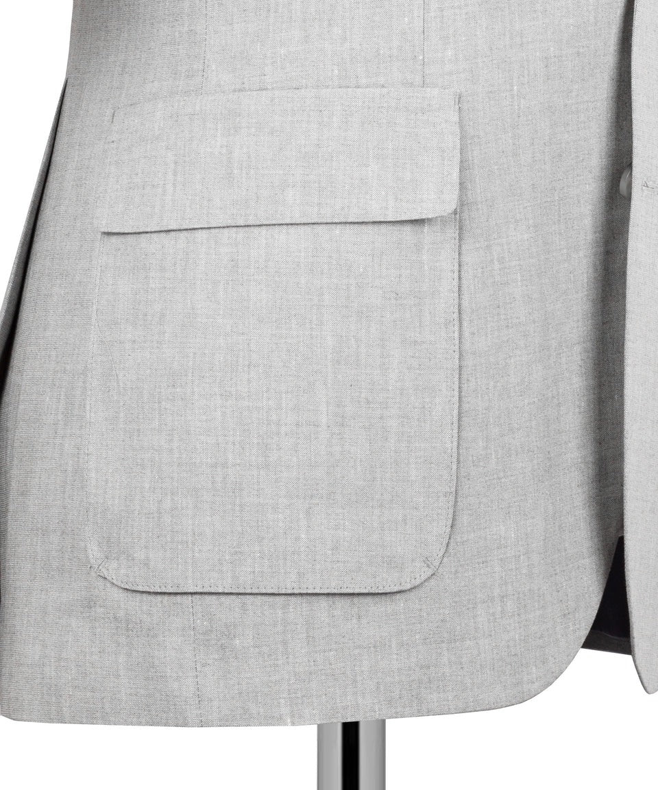 Close-up of a gray suit jacket with a pocket on a white background
