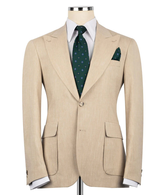 Beige suit jacket with a green tie and pocket square