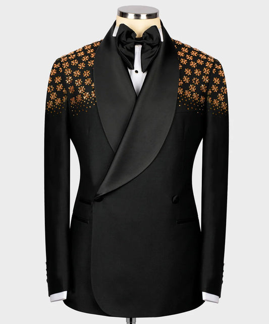 Black tuxedo with floral patterns on shoulders on a mannequin against a white background