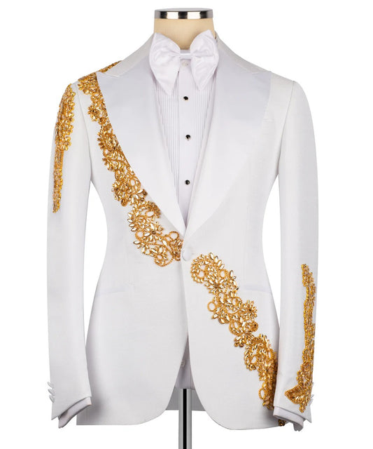 White tuxedo with gold embroidery on a mannequin 