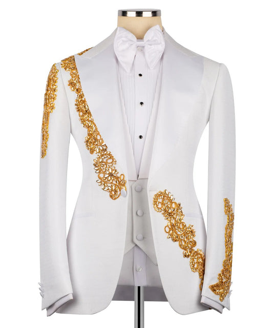 White tailcoat with gold embroidery on a mannequin