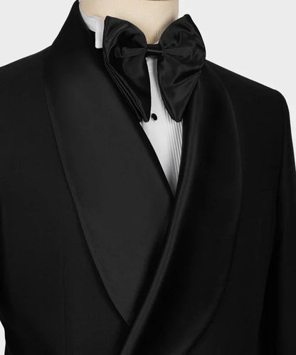 KOSS ATELIER black double breasted tuxedo with satin shawl lapel pleated white shirt and silk bow tie