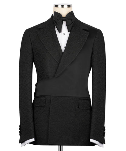 KOSS ATELIER black double-breasted tuxedo with satin shawl lapel bow tie and asymmetrical waist panel