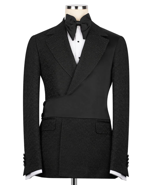 KOSS ATELIER black double-breasted tuxedo with satin shawl lapel bow tie and asymmetrical waist panel