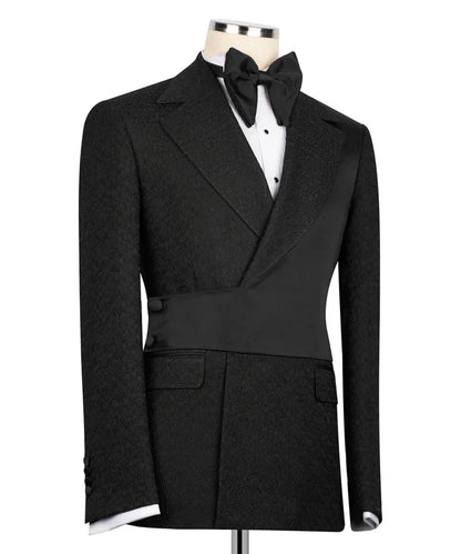 KOSS ATELIER black double-breasted tuxedo jacket on mannequin with satin shawl lapel waist sash and bow tie