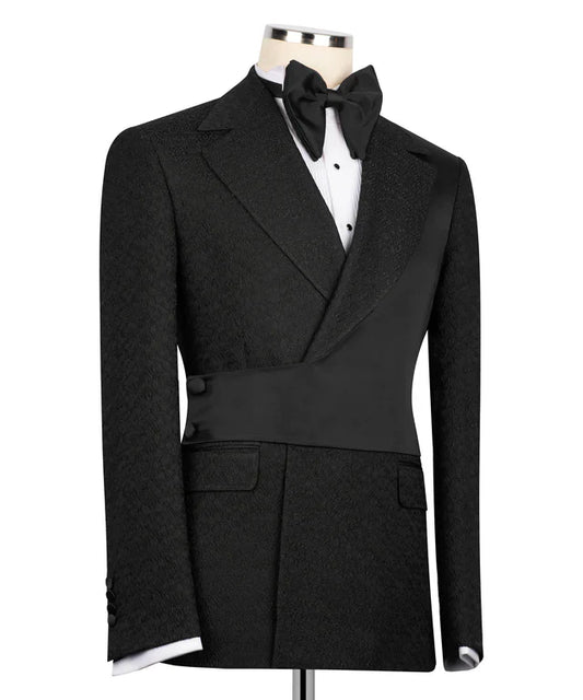 KOSS ATELIER black double-breasted tuxedo jacket on mannequin with satin shawl lapel waist sash and bow tie