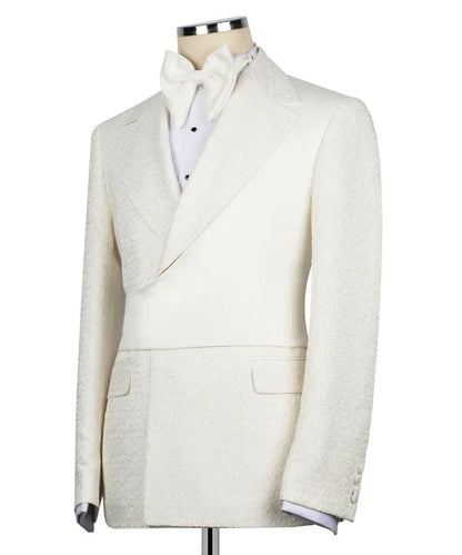 KOSS ATELIER cream double breasted tuxedo jacket with textured fabric peak lapels and white bow tie