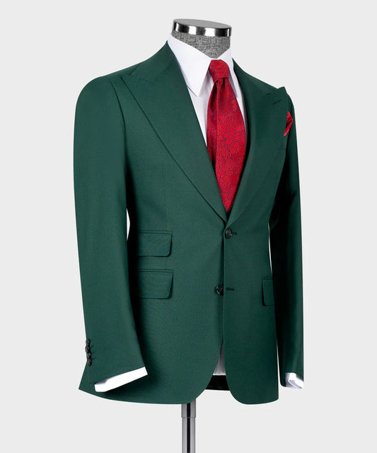 KOSS ATELIER dark green 3-piece suit displayed on mannequin with white shirt red tie pocket square