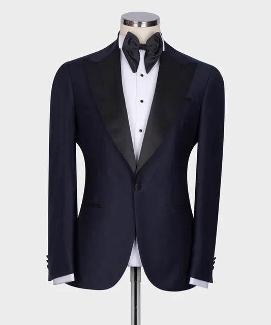KOSS ATELIER Classic Dark Blue Tuxedo on mannequin with satin peak lapels black bow tie