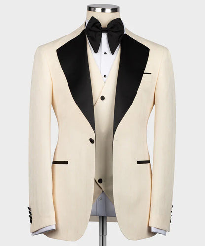 KOSS ATELIER cream tuxedo with black satin collar and matching waistcoat white shirt black bow tie