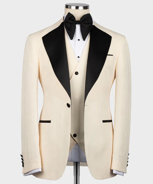 KOSS ATELIER cream tuxedo with black satin collar and matching waistcoat white shirt black bow tie