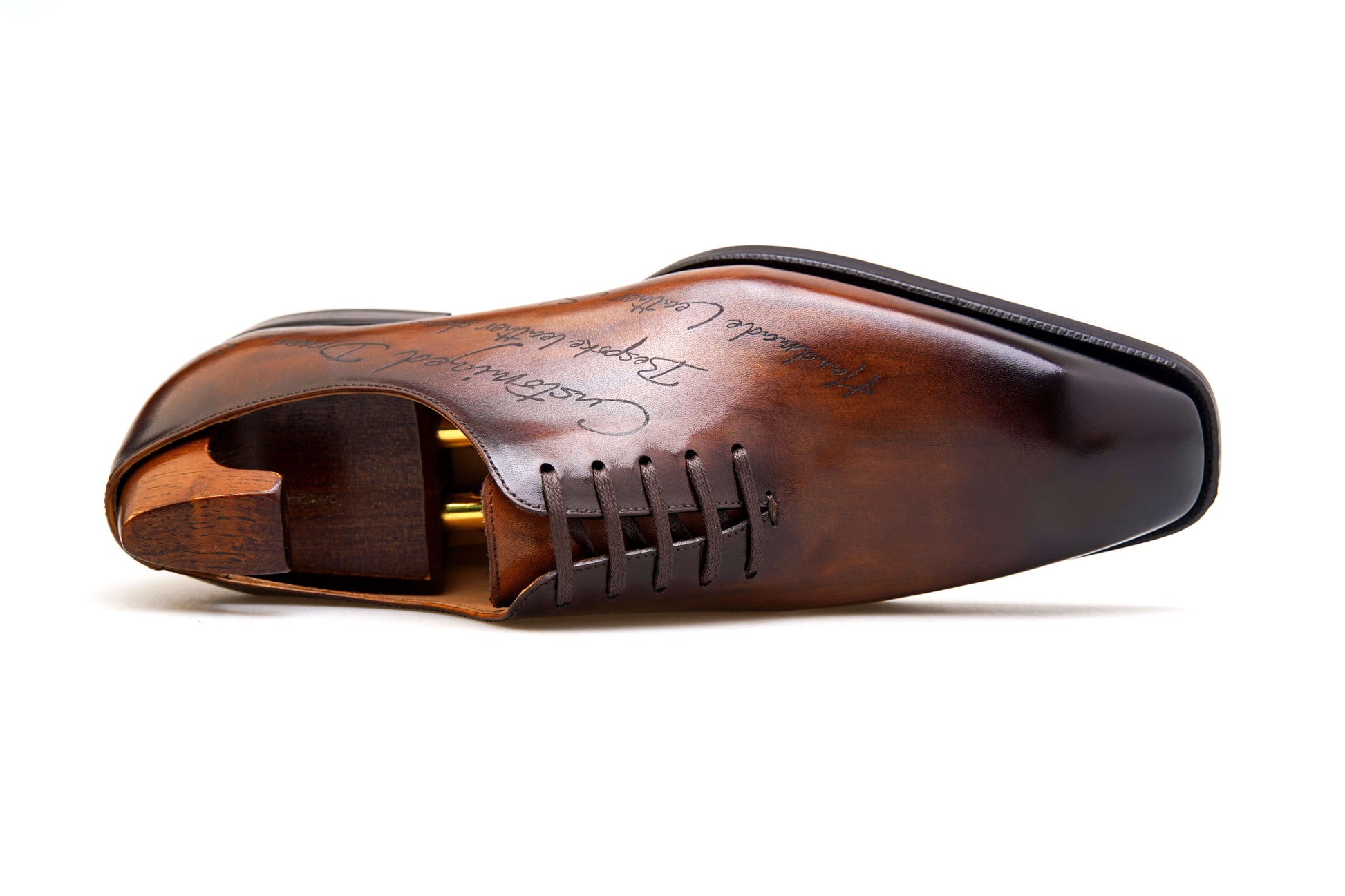 Bespoke patina leather shoes handcrafted for elegance and comfort, showcasing a unique finish