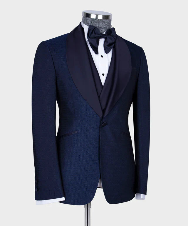 KOSS ATELIER navy formal tuxedo for men on mannequin with shawl lapel bow tie and white shirt