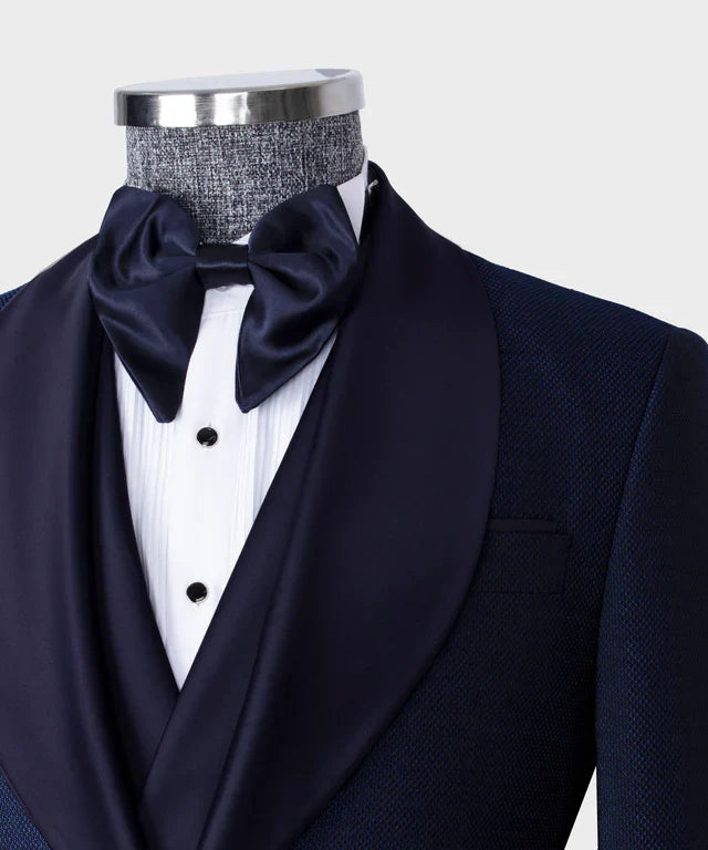 KOSS ATELIER navy formal tuxedo for men with shawl lapel satin bow tie white pleated shirt and black studs