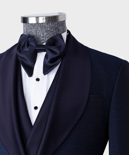 KOSS ATELIER navy formal tuxedo for men with shawl lapel satin bow tie white pleated shirt and black studs