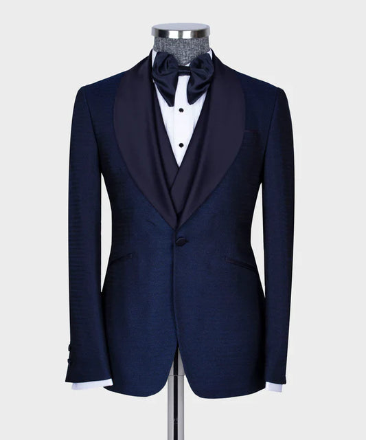 KOSS ATELIER navy formal tuxedo for men on mannequin with satin peak lapel bow tie and vest