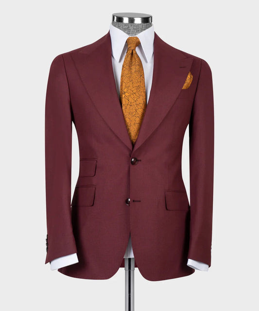 KOSS ATELIER maroon three piece suit for men on mannequin with white shirt gold tie and pocket square