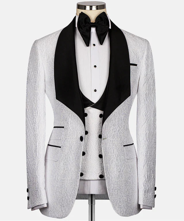 KOSS ATELIER White & Black Embossed Tuxedo with black satin shawl lapel and double breasted vest on mannequin