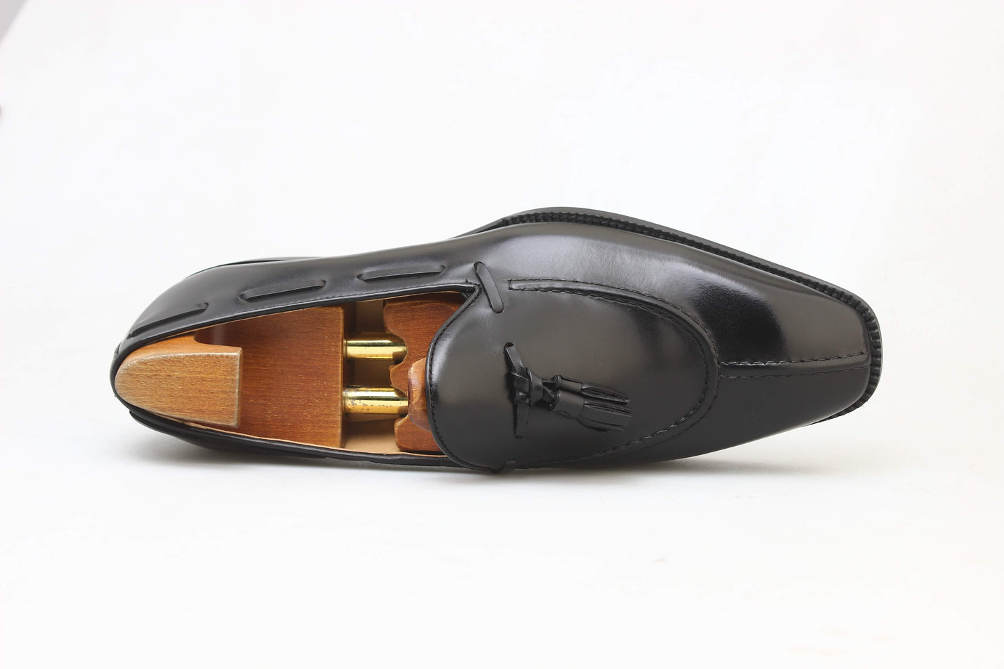 KOSS ATELIER black leather tassel loafers with elegant design and wooden shoe trees