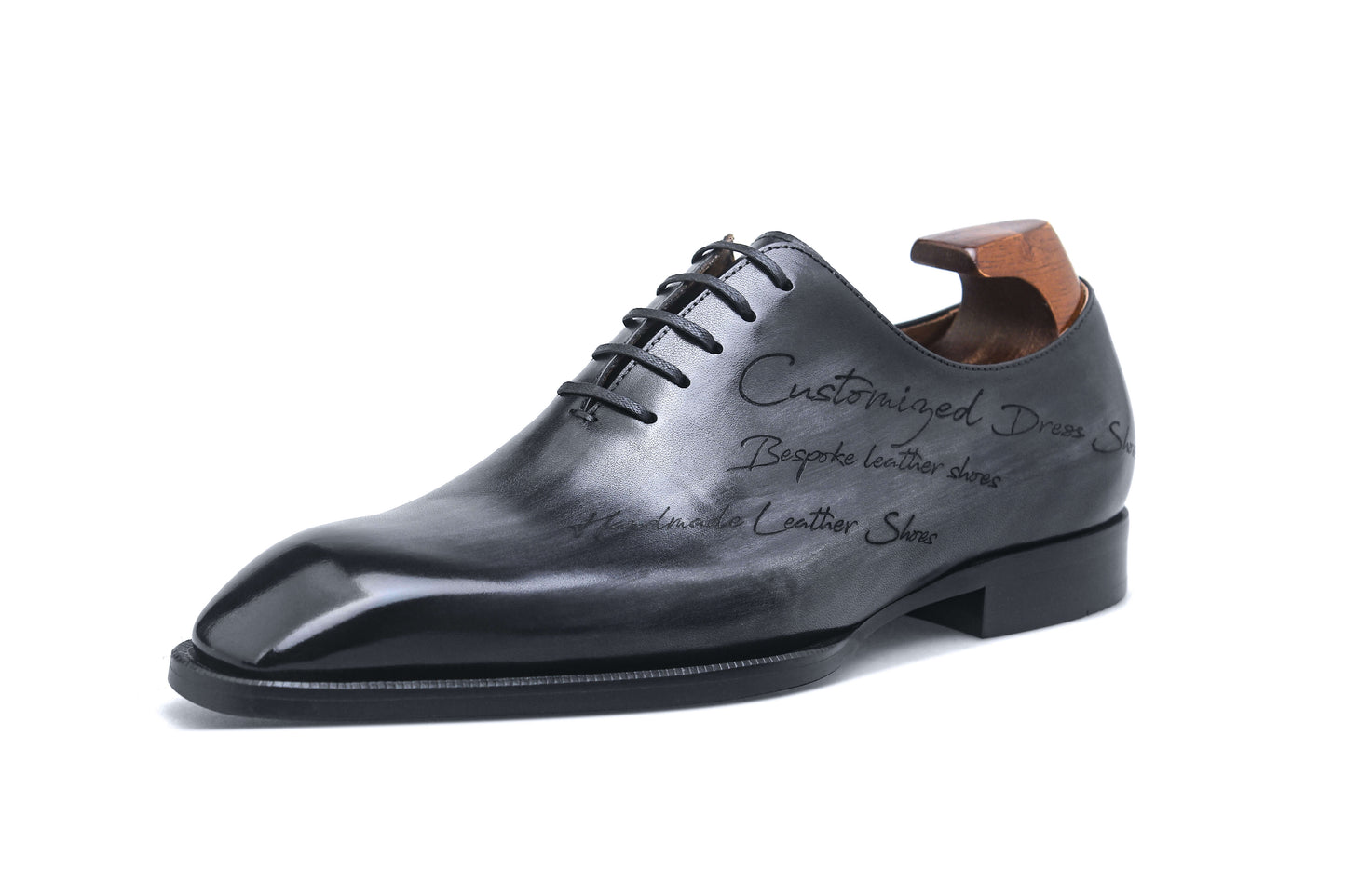 KOSS ATELIER black patina dress shoes with a sleek finish and intricate detailing