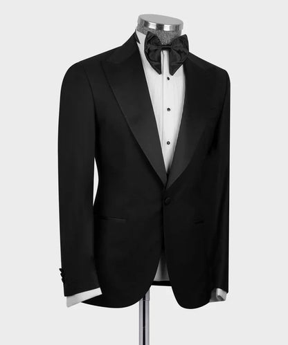 KOSS ATELIER Black Three-Piece Tuxedo with satin lapel and bow tie on mannequin