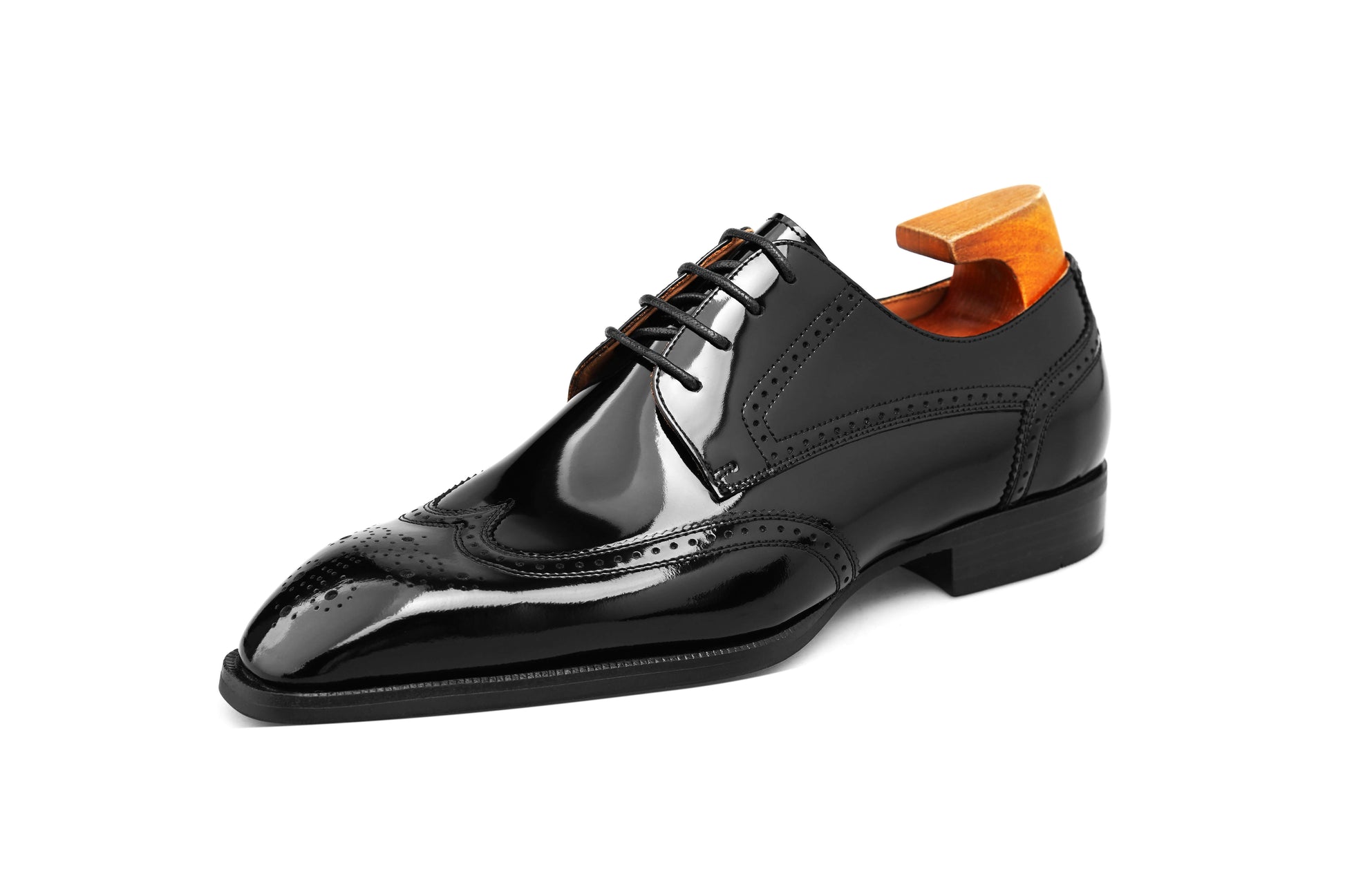 KOSS ATELIER black wingtip oxford shoes with a glossy finish and elegant brogue detailing