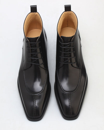 KOSS ATELIER Blackmore chukka boots polished black leather lace up ankle boots with tan lining top view