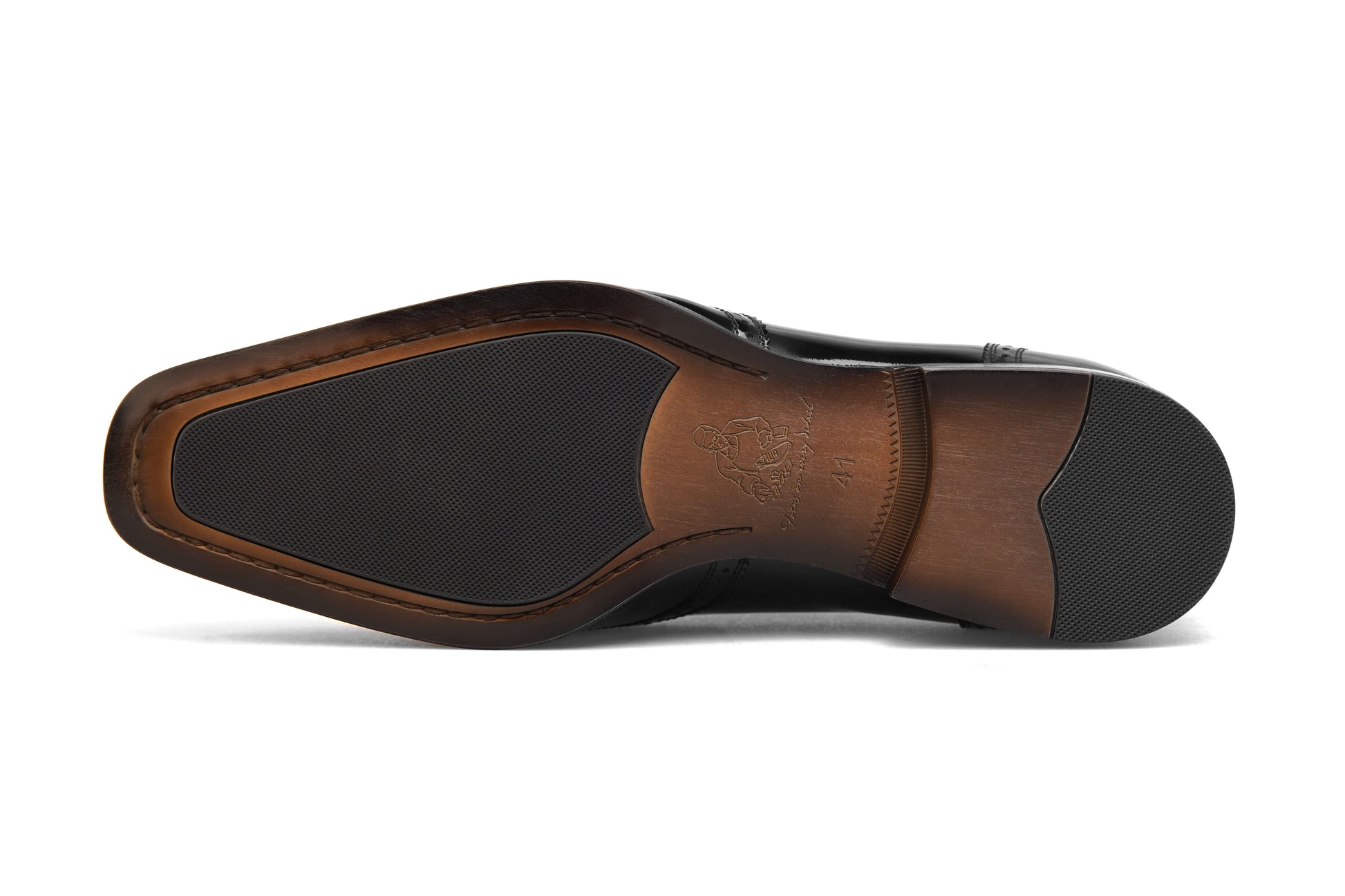 Sole of KOSS ATELIER brown patent wingtip oxford shoes with detailed craftsmanship for premium style
