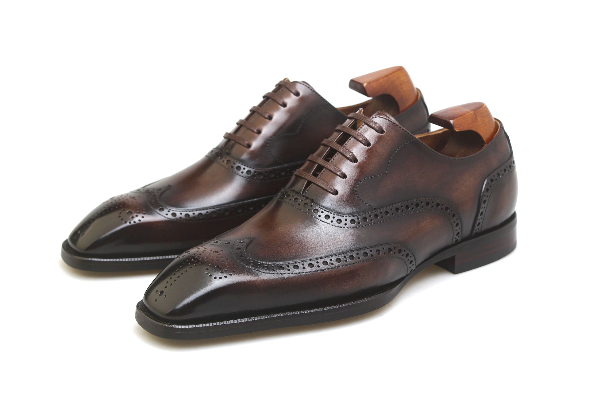 KOSS ATELIER chocolate brown wingtip shoes with intricate brogue detailing and classic lacing system