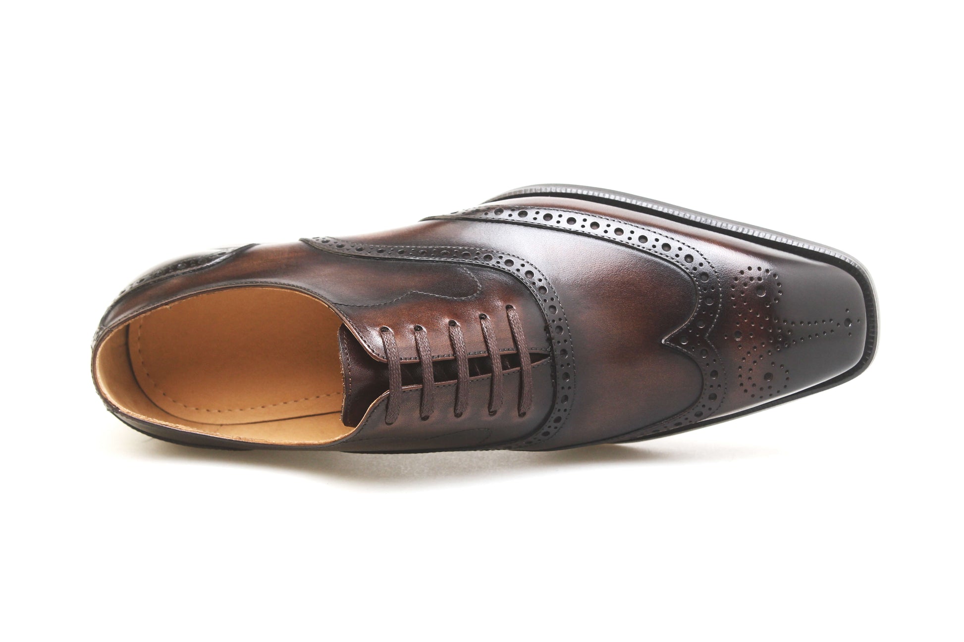 KOSS ATELIER chocolate brown wingtip shoes with intricate detailing and a polished finish