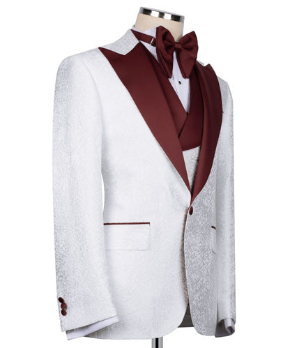 KOSS ATELIER white textured tuxedo for men with burgundy shawl lapel, vest, and bow tie