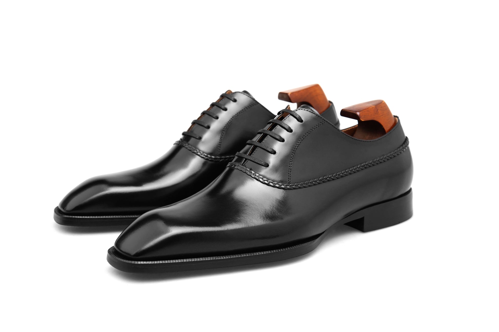 Elegant black Balmoral oxfords featuring a sleek design and polished leather finish