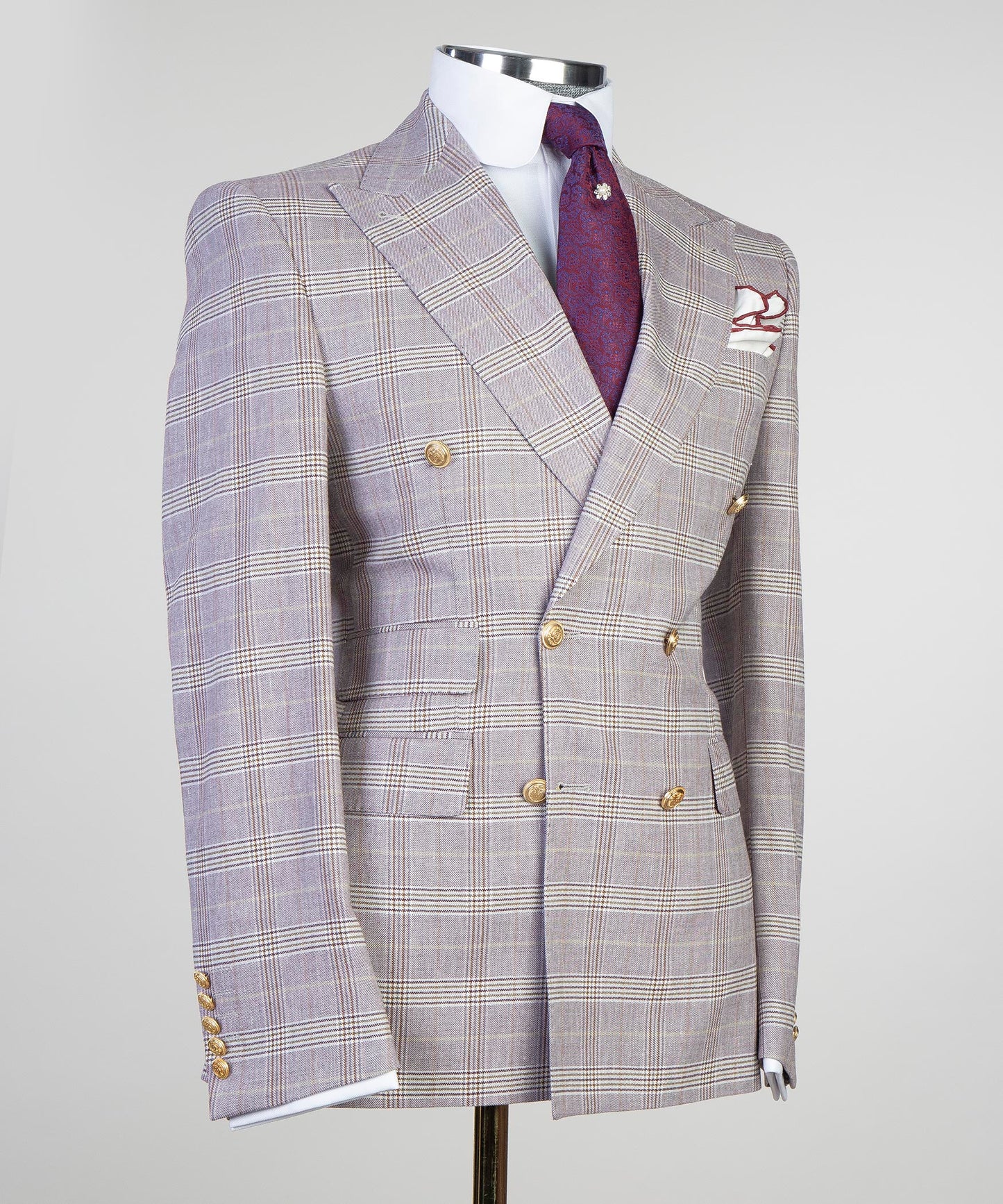 Light gray formal double breasted suit tailored with a checkered pattern and elegant details