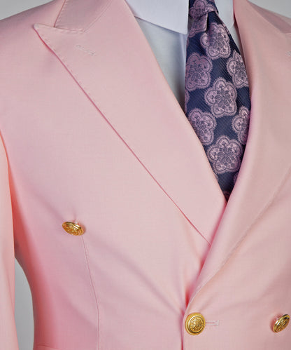 Light pink Double Breasted blazer with gold buttons and a patterned tie for a stylish look