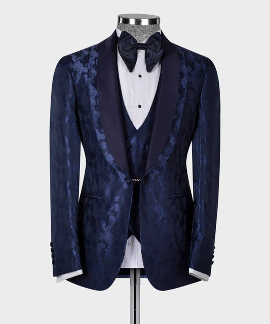 KOSS ATELIER blue tuxedo for men with navy jacquard pattern shawl lapel matching vest and bow tie on mannequin