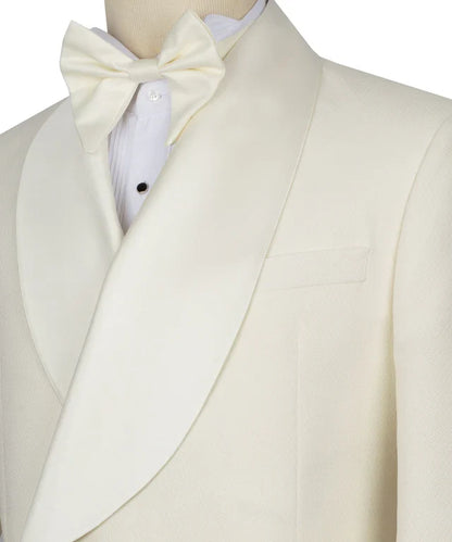 KOSS ATELIER cream double breasted tuxedo with wide shawl lapel cream bow tie and pleated tuxedo shirt