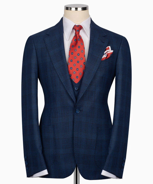 KOSS ATELIER dark blue checkered suit for men on mannequin with white shirt red patterned tie